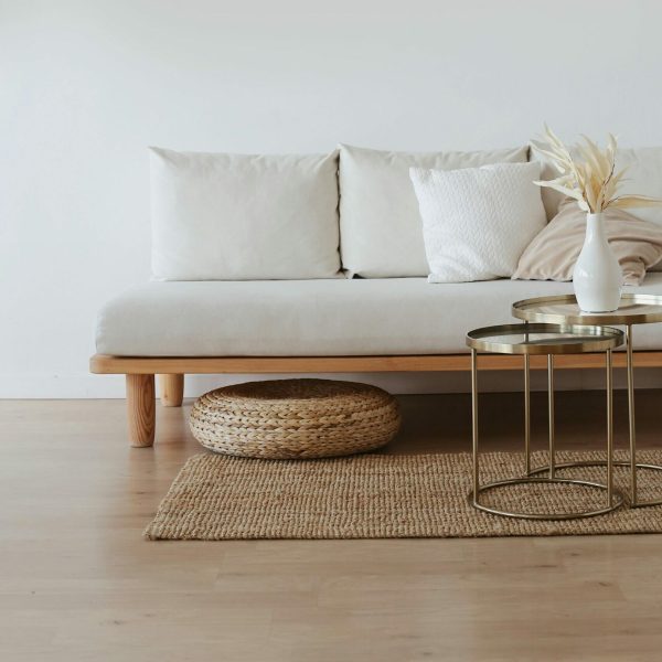 White Couch on Wooden Floor